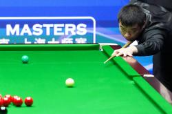 （体育）斯诺克——上海(hǎi)大师赛：罗伯逊胜庞俊旭